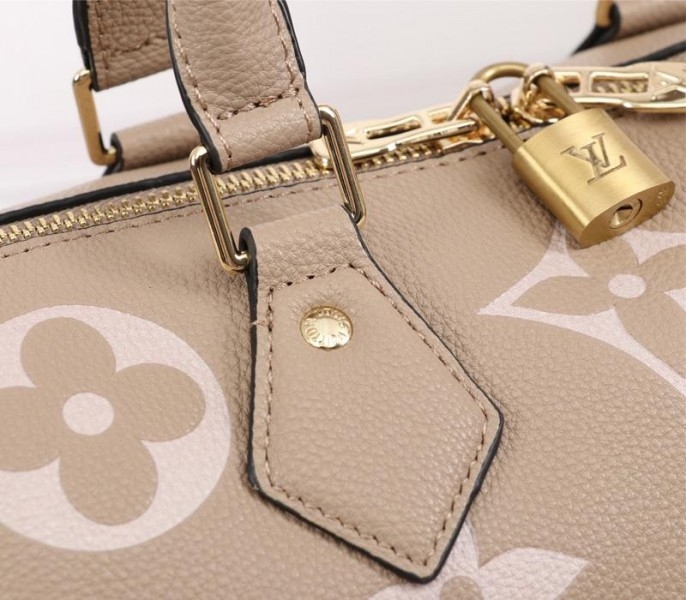 L0vis Vvtt0n Bicolor Monogram Empreinte Leather Speedy Bandouliere 25 Handbag In Tourterelle Gray And Cream