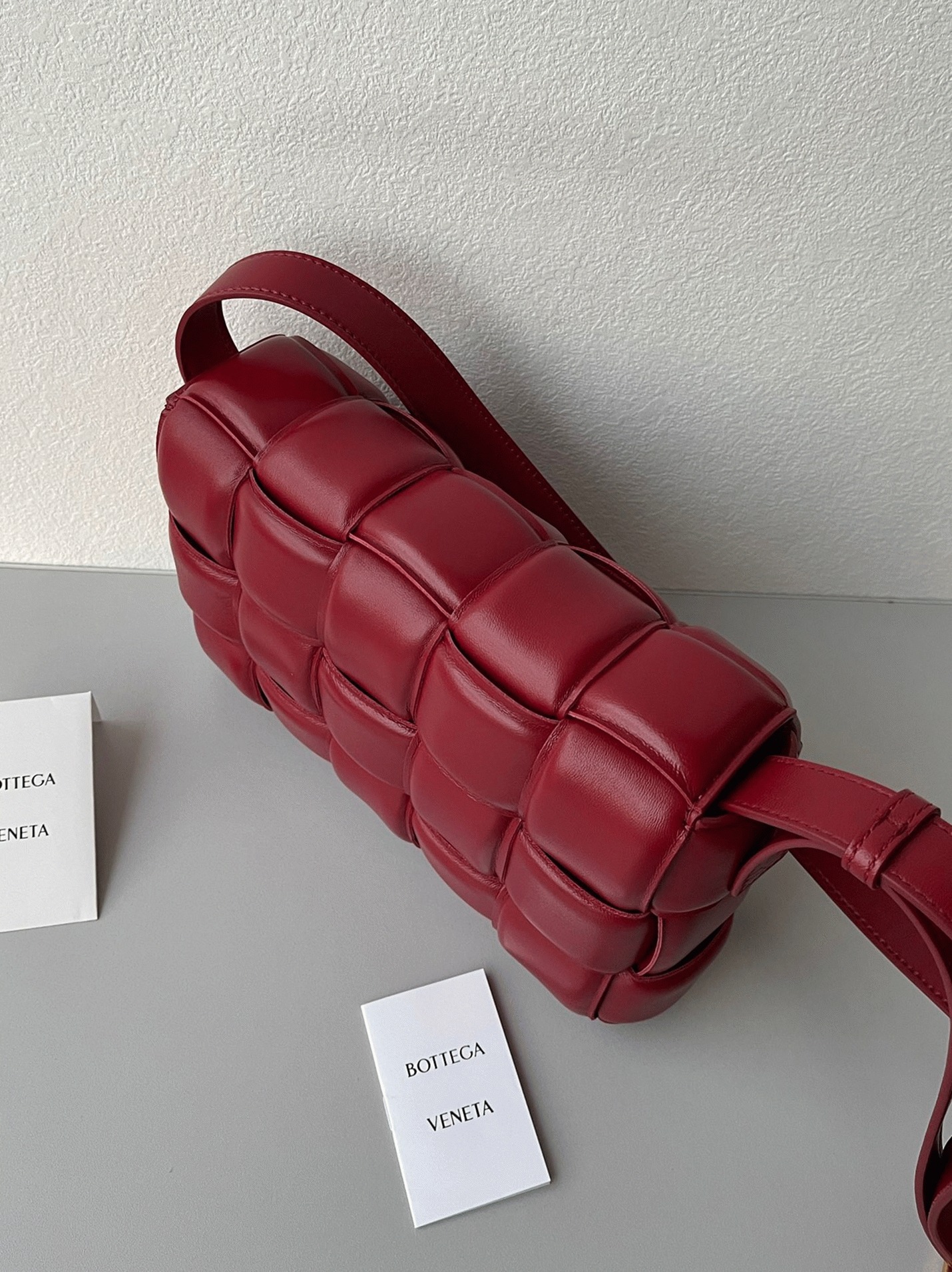 Top Quality Faux B0tt*ga Ven*ta Padded Cassette Bag In Dark Red