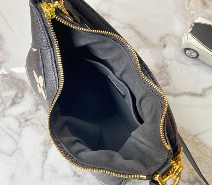 L0vis Vvtt0n Bicolor Monogram Empreinte Leather Bagatelle Mini Hobo In Black