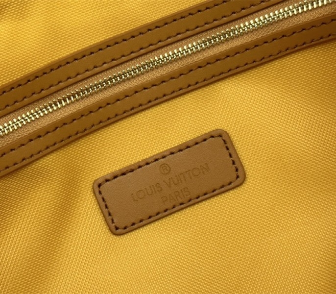 L0vis Vvtt0n Monogram Heritage Canvas Keepall Bandouliere 55 In Yellow