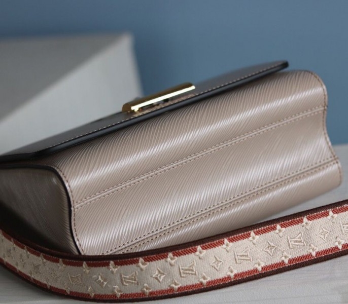 L0vis Vvtt0n Epi Leather Twist MM Handbag In Galet Gray With Embroidered Strap