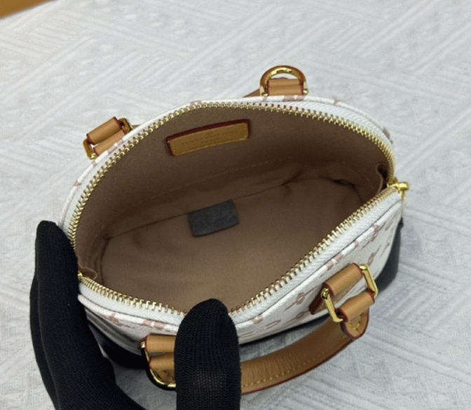L0vis Vvtt0n Monogram Dune Canvas Nano Alma Bag