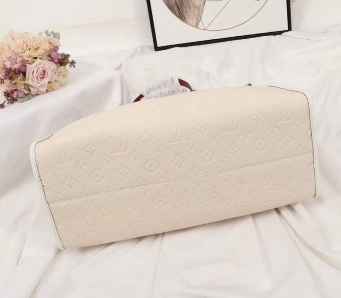 L0vis Vvtt0n Monogram Empreinte Onthego GM Tote In Cream