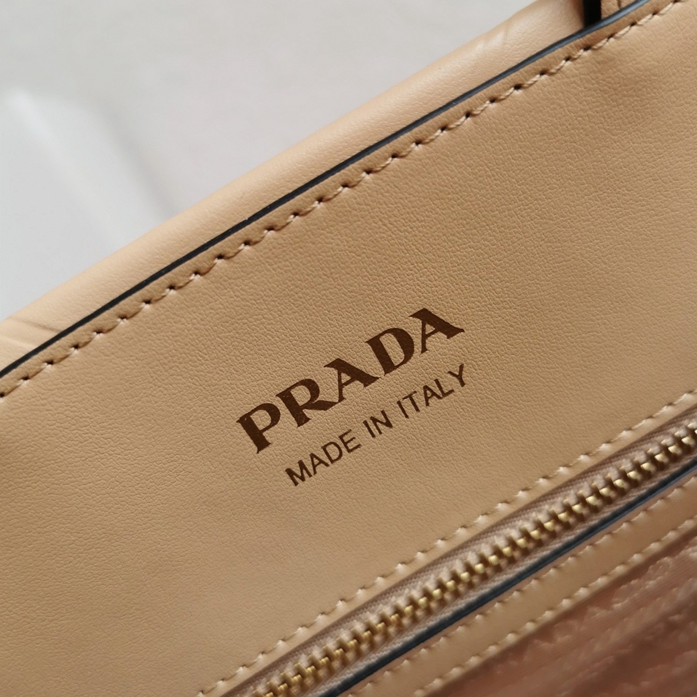 Pra*a Symbole Small Bag Imitation with Topstitching in Beige